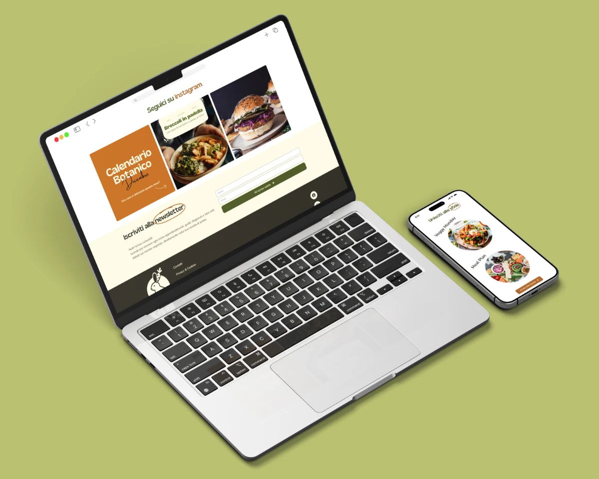 Mockup di un laptop e uno smartphone che mostrano il web design del blog di alimentazione vegetale Green Carrots. Sul laptop: widget newsletter e feed Instagram. Sullo smartphone: menu “Unisci alle sfide” con icone per “Veggy Monday” e “Meal Plan”